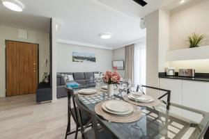Posedenie v ubytovaní P&O Apartments Służewiec