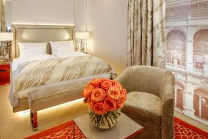 Ένα ή περισσότερα κρεβάτια σε δωμάτιο στο Boutiquehotel Das Tyrol