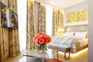 Ένα ή περισσότερα κρεβάτια σε δωμάτιο στο Boutiquehotel Das Tyrol