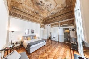 A bed or beds in a room at Relais Della Porta