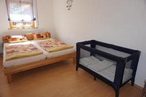 Postel nebo postele na pokoji v ubytování Ferienwohnung Stettfeld