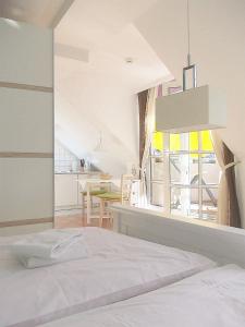 Ostsee Ferienappartement Dierhagen-Strand tesisinde bir odada yatak veya yataklar
