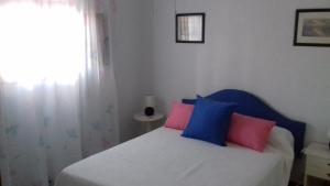 A bed or beds in a room at Casa Paquita Y Telesforo