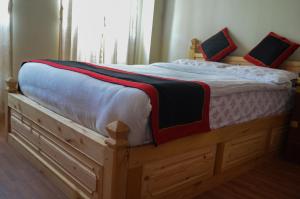 Uma cama ou camas num quarto em Newa Home