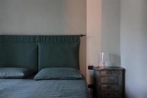 Postel nebo postele na pokoji v ubytování B&B a Ca' Minore Franciacorta