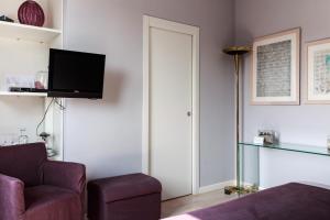 TV a/nebo společenská místnost v ubytování B&B a Ca' Minore Franciacorta