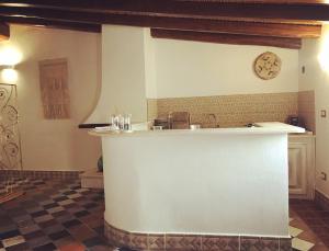 a kitchen with a counter top in a room at Ogliastra Luxury Apartment - AJPSARDINIA in Tortolì +42 photos