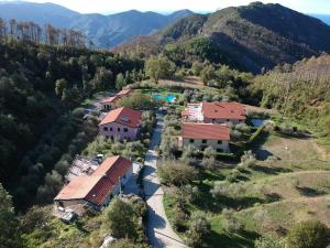 an aerial view of a house in the mountains at Hotel La Rossola Resort & Natura in Bonassola