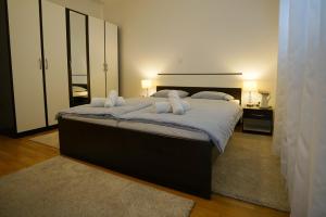 Posteľ alebo postele v izbe v ubytovaní Apartman Reno