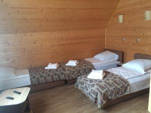 Postel nebo postele na pokoji v ubytování Camelot