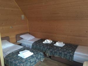 Postel nebo postele na pokoji v ubytování Camelot