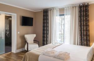 Postel nebo postele na pokoji v ubytování Atlantic Heritage Luxury Villa + 38 fotografií