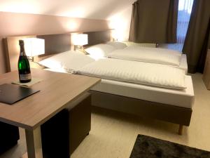 Postel nebo postele na pokoji v ubytování Hana Aparthotel