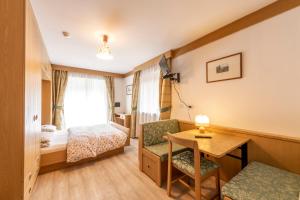 Fotografie z fotogalerie ubytování Hotel Alpe v destinaci Canazei