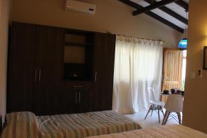Gulta vai gultas numurā naktsmītnē Mandala Apartments