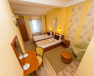 Posteľ alebo postele v izbe v ubytovaní Hotel Pine