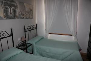 Ένα ή περισσότερα κρεβάτια σε δωμάτιο στο Casa El Molino