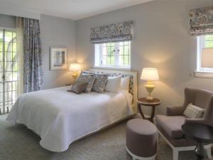 Een bed of bedden in een kamer bij Granville Inn