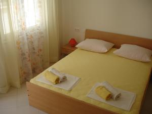 Cama o camas de una habitación en Rooms Andrijana