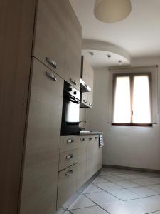 Kuchyň nebo kuchyňský kout v ubytování 21House - Appartamento 1 + 9 fotografií