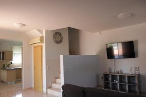 Kuchyň nebo kuchyňský kout v ubytování Platoni Elite Villas