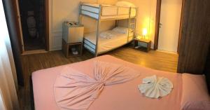 Katil atau katil-katil dalam bilik di Hotel Golden