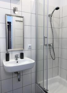 Kúpeľňa v ubytovaní Pulawska Nr 1 + 3 fotografie