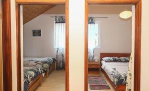 Ένα ή περισσότερα κρεβάτια σε δωμάτιο στο Apartments Mond