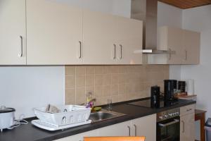 Kuchyň nebo kuchyňský kout v ubytování Mountain View Rooms