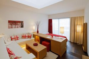 Katil atau katil-katil dalam bilik di Tauern Spa Hotel & Therme