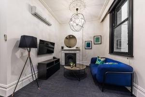 TV a/nebo společenská místnost v ubytování East Brunswick Hotel