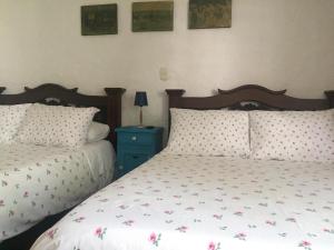 Postel nebo postele na pokoji v ubytování Hotel Casona Las Juanas + 37 fotografií
