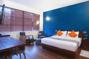 Tempat tidur dalam kamar di Colombo Court Hotel & Spa