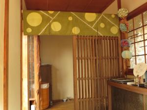 Kuchyň nebo kuchyňský kout v ubytování Guest house Roji to Akari