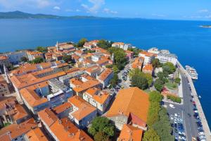 an aerial view of a town next to the water at Teatro Verdi Boutique Hotel in Zadar