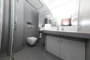 A bathroom at Aiolos Apartments Suites Ermou 64 Monastiraki Plaka 2nd Floor