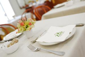 A restaurant or other place to eat at Hotel Ziò Imola