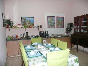 Kuchyň nebo kuchyňský kout v ubytování Garden House Ercolano