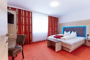Łóżko lub łóżka w pokoju w obiekcie Apartment Bergsee