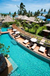 an aerial view of a pool at a resort at Deva Beach Resort Samui in Choeng Mon Beach