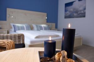 Postel nebo postele na pokoji v ubytování Mein Inselhotel