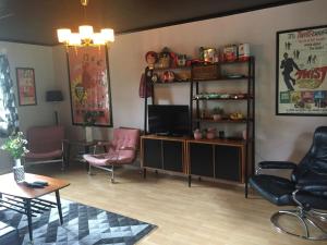 TV a/nebo společenská místnost v ubytování Mandy's Inn