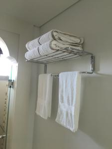 a bathroom with towels hanging on a towel rack at Marrakesh Residence 311 in Hua Hin
