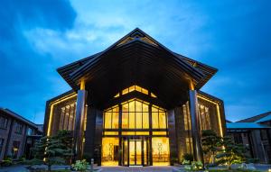 a building with a black roof at Lin Yin Art Hotel Shanghai（Pudong airport） in Shanghai