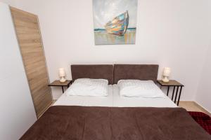 Ein Bett oder Betten in einem Zimmer der Unterkunft Villa Neda