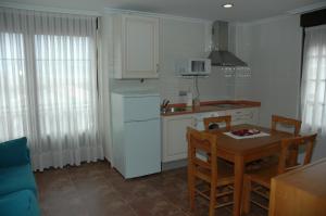 Photo de la galerie de l'établissement Apartamentos Torremar, à Isla 13 autres photos