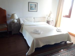 Postel nebo postele na pokoji v ubytování Two Elegant Depandance