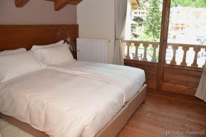 Postel nebo postele na pokoji v ubytování Residence Orma