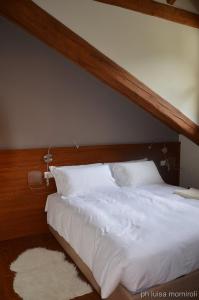 Postel nebo postele na pokoji v ubytování Residence Orma