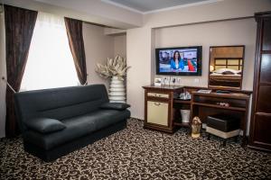 TV a/nebo společenská místnost v ubytování Hotel Megalos